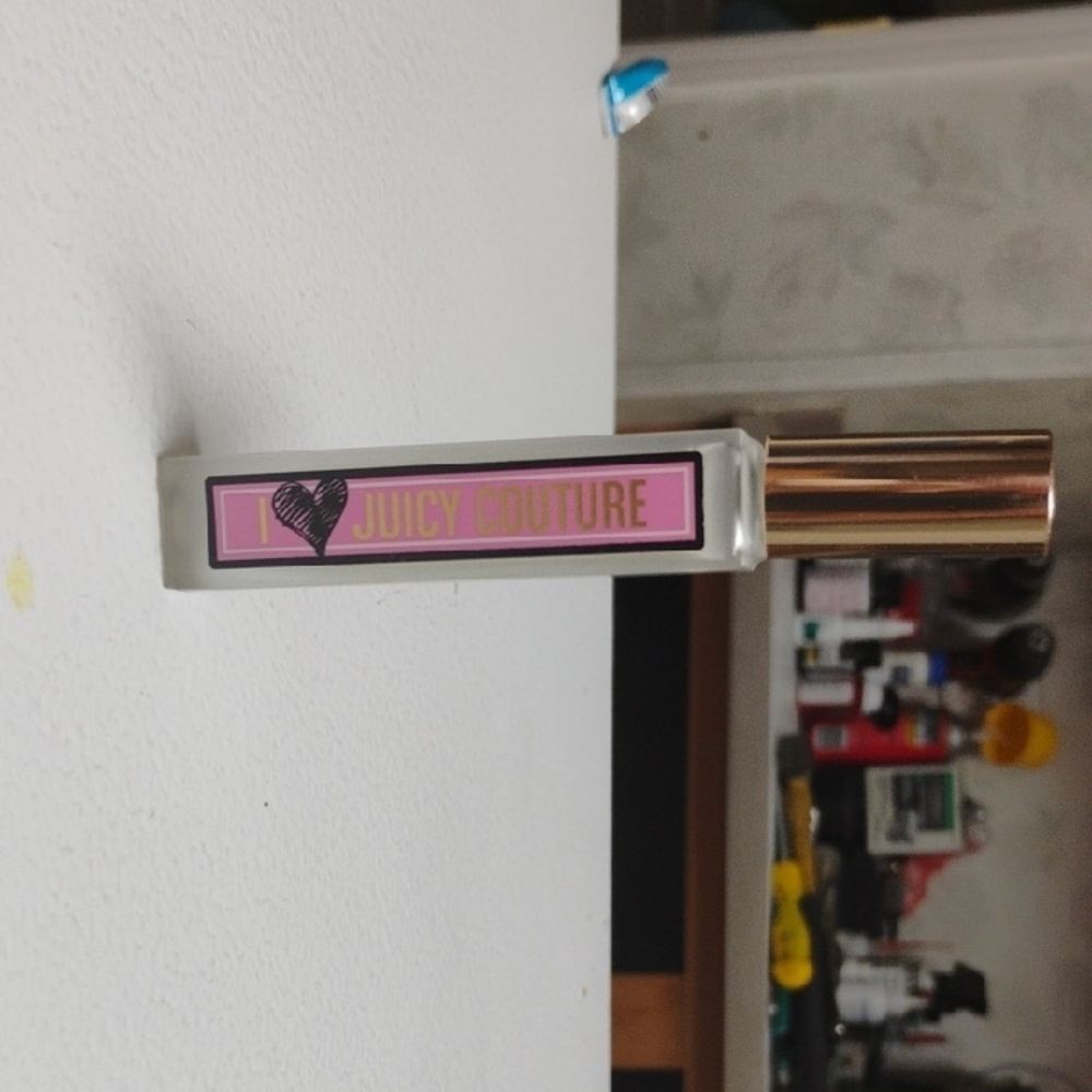 Juicy Couture Perfume with Pink and Gold Accents